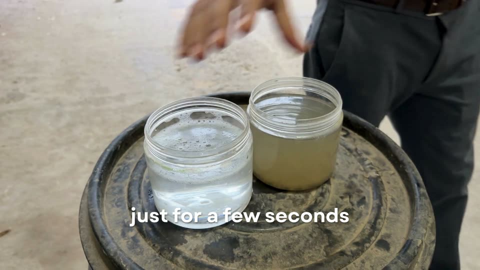Two jars side by side: clear treated water next to untreated sewage